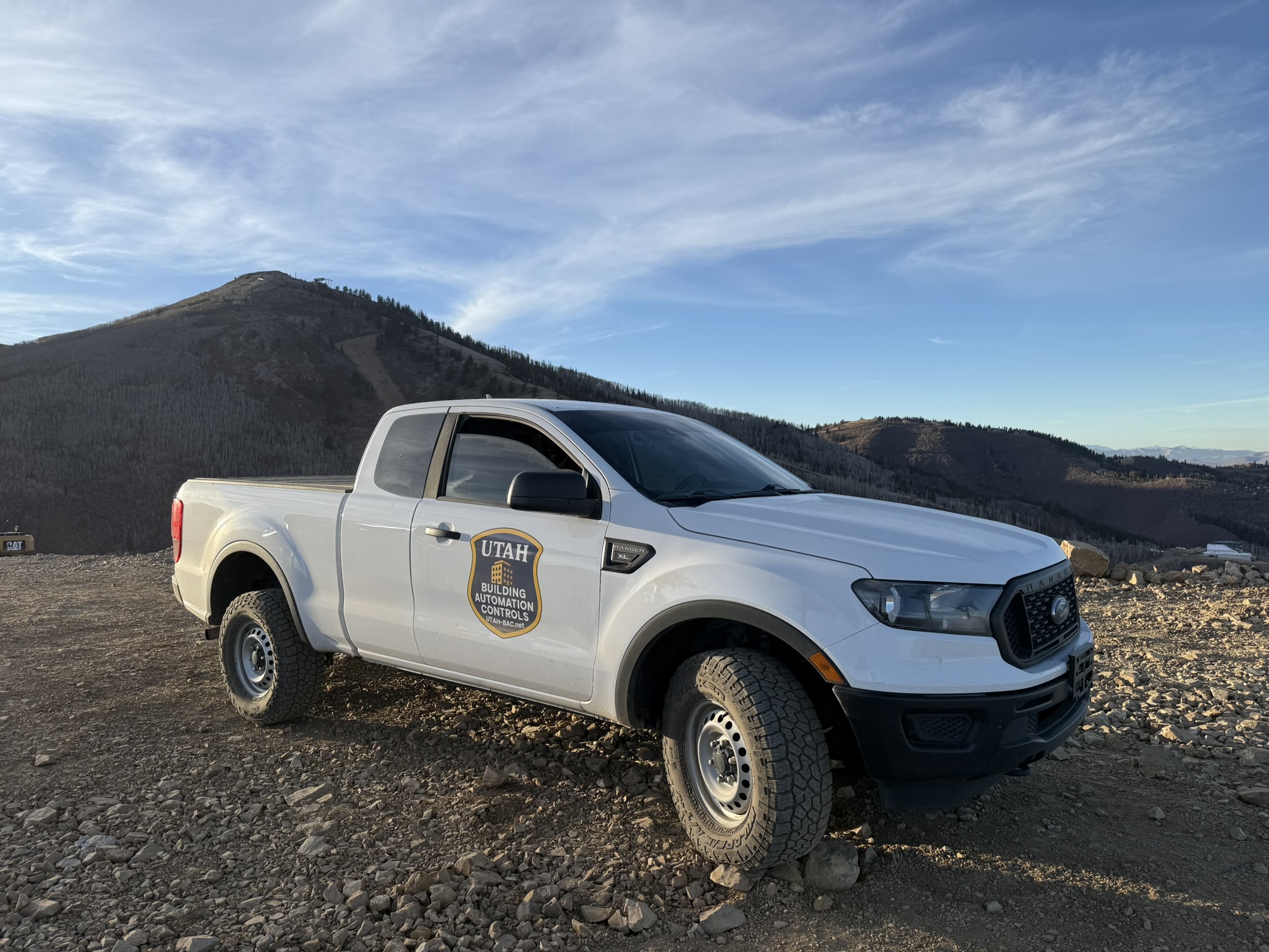 A Utah-BAC service truck at a mountain job site